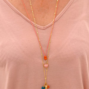 Mina's handmade necklace with vintage pendant