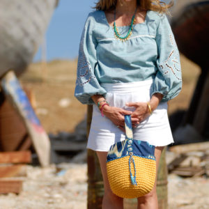 Wearing Ancient Kallos cut out embroidered blouse and Mina's handmade accessories