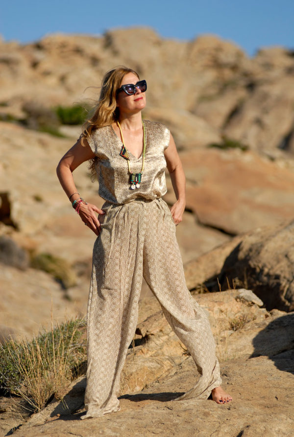 Wearing Wengko Mole silk top and wide pants, with Mina's handmade boho necklace