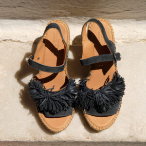 Naguisa suede leather wedges with pom poms