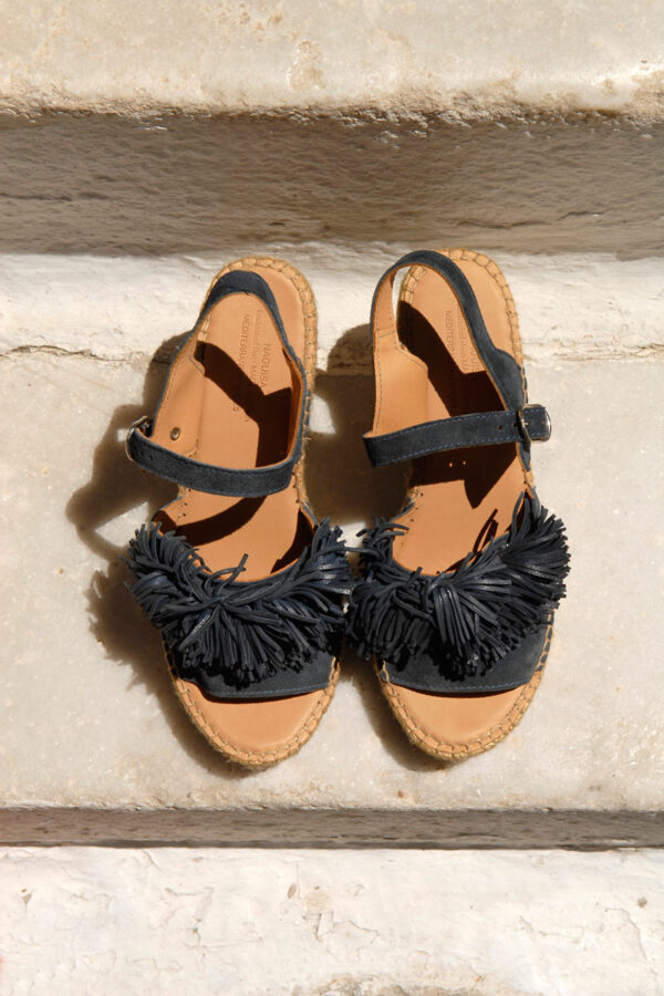 Naguisa suede leather wedges with pom poms