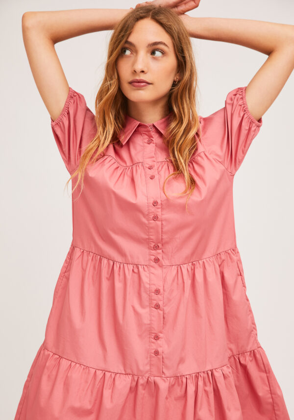 Model wearing pink cotton dress