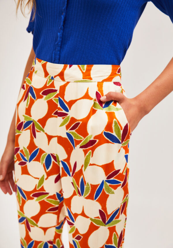 Close up photo, model wearlng murlticolor print pants