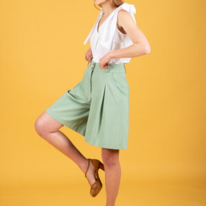 Model wearing green tea shorts
