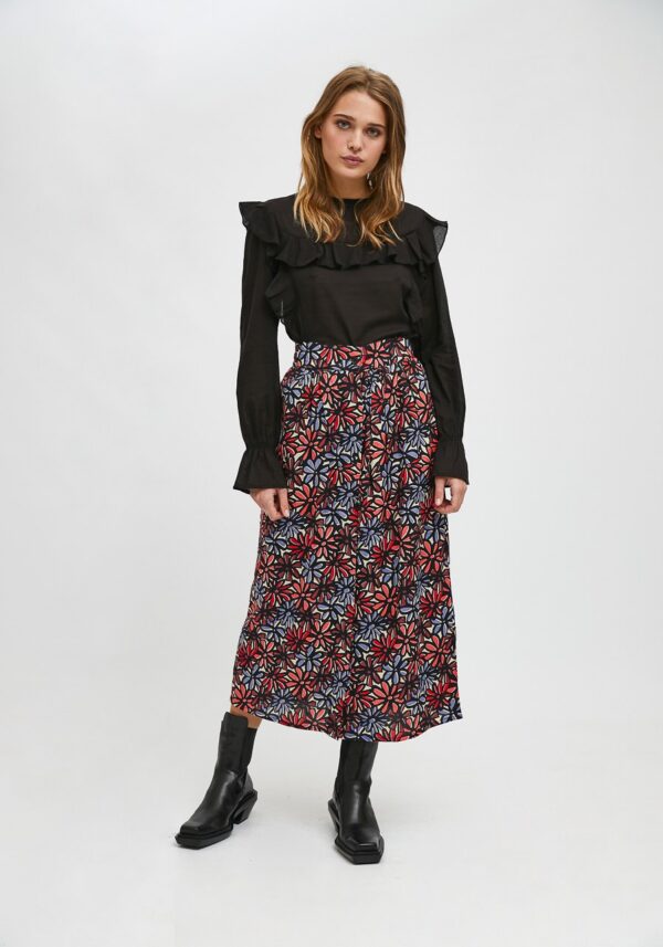 Model wearing floral print midi skirt