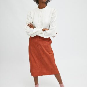 Model wearing polka dot midi skirt