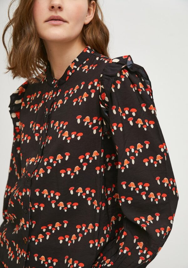 Close up photo, model wearing black print viscose shirt