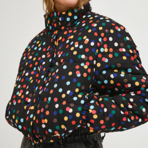 Close up photo, model wears polka dot print jacket