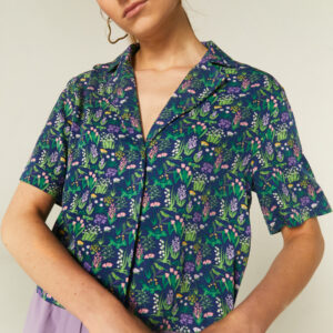 Close up photo, model wears flower print blouse