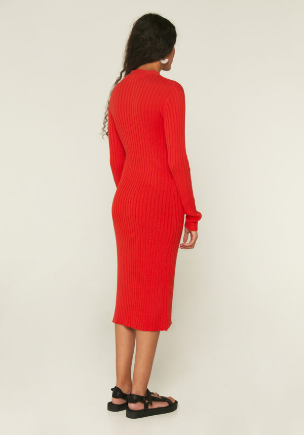 Model wears, red ribbed stretch dress