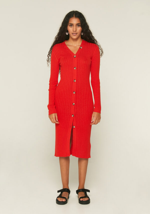 Model wears, red knit dress