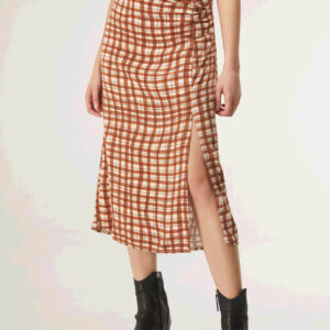 Close up photo, model wears gingham midi skirt