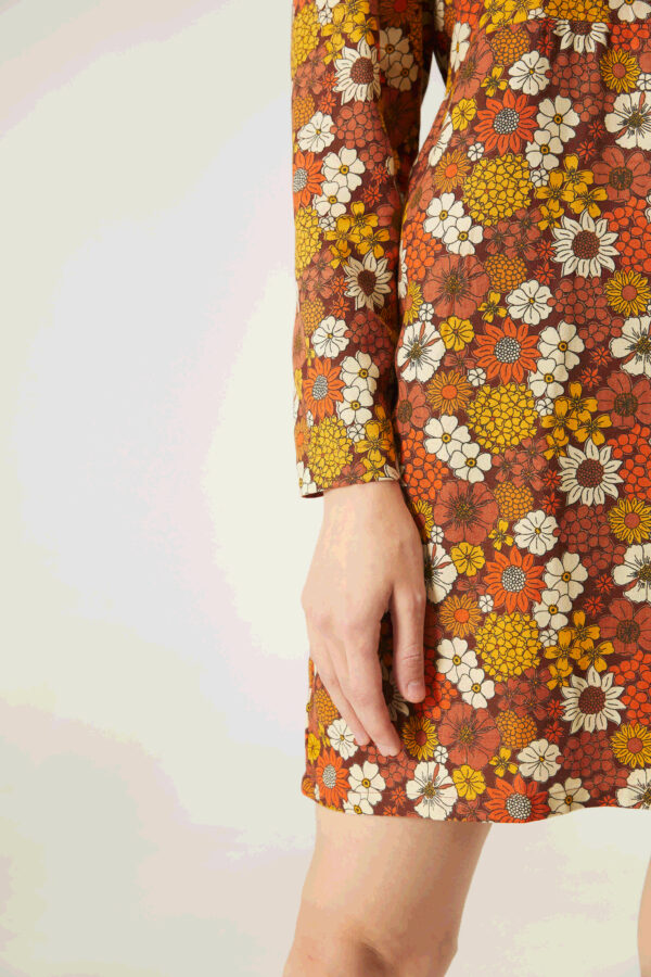 Close up photo model wears flower print short dress