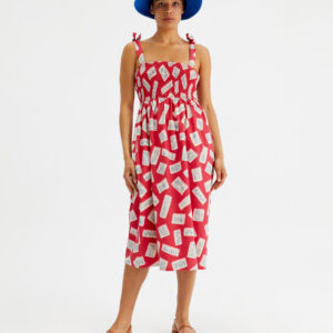 Model wears geometric print dress