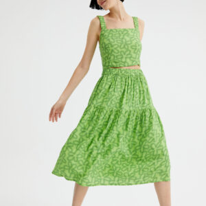 Model wears lime viscose midi skirt