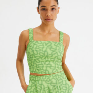 Model wears lime top