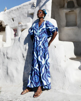 Model wears blue cotton print long dress